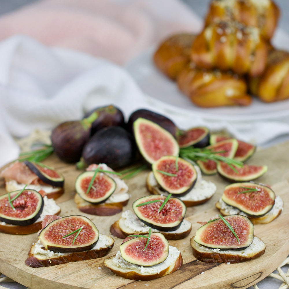 Fig and Herbed Cheese Pretzel Toasts